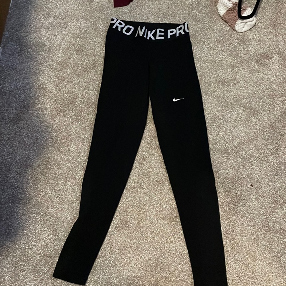Small nike leggings with mesh at the bottom